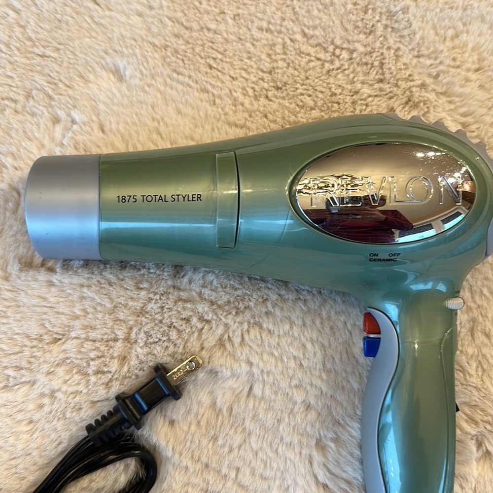 Like new. Revlon hair dryer